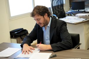 Producción y ASIP firmaron un acuerdo de fiscalización para el sector comercial